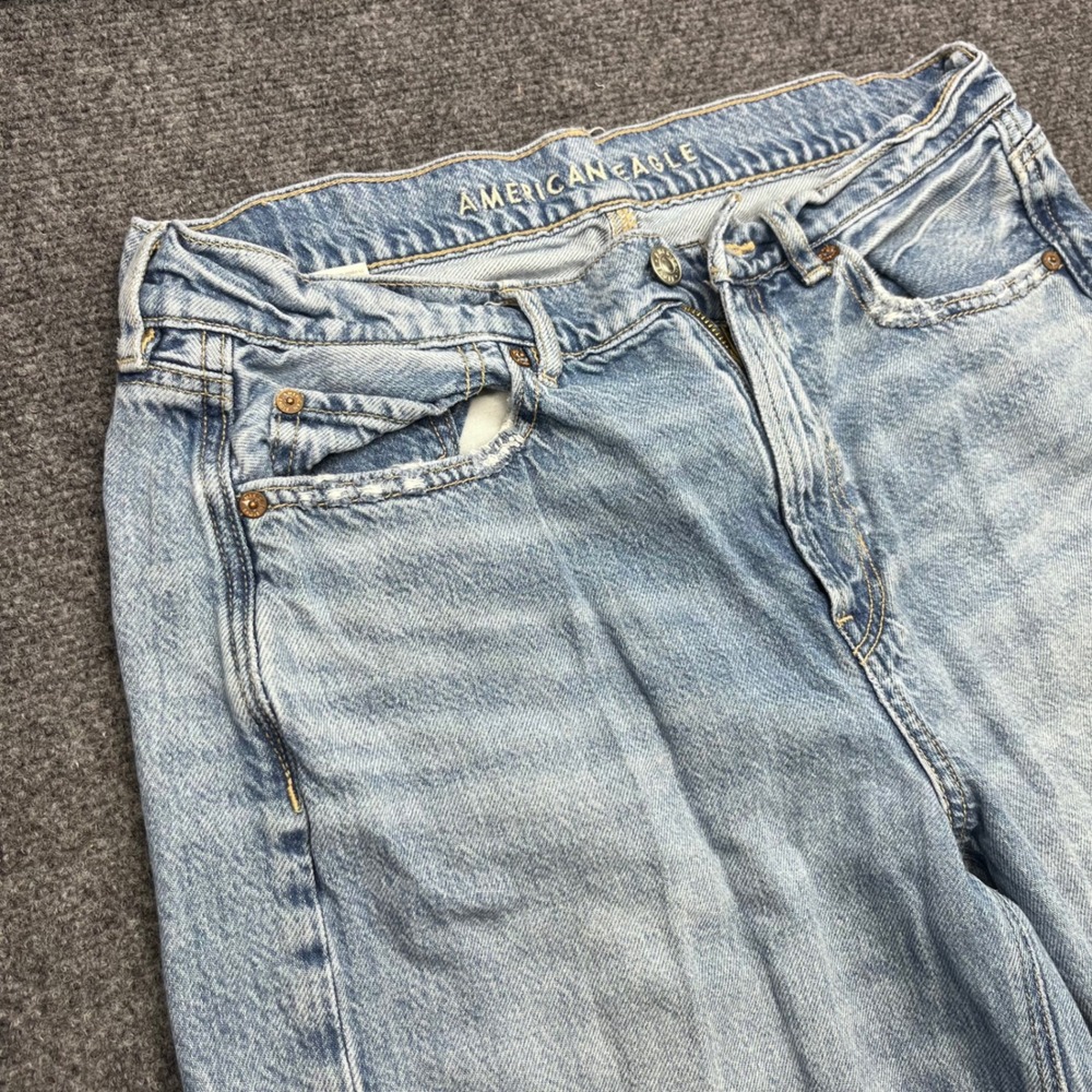American Eagle Wide Leg High Rise Raw Hem Light Wash Denim Jeans